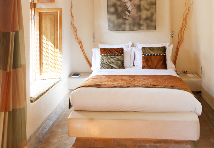 Textured Square Pillows Add Rich Contrast to White Bedding