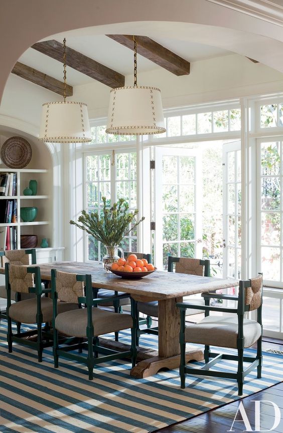 Green-Framed Chairs Complement a Reclaimed Wood Table