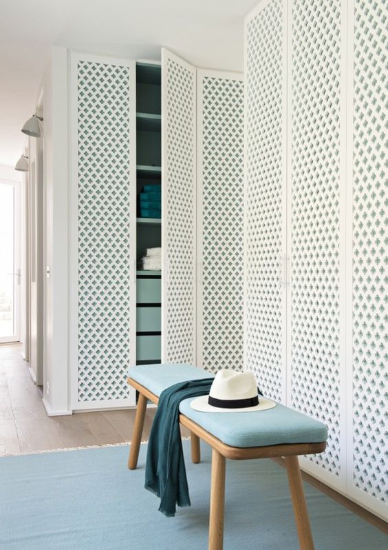 White Lattice Doors Add a Breezy Pattern to Tall Storage