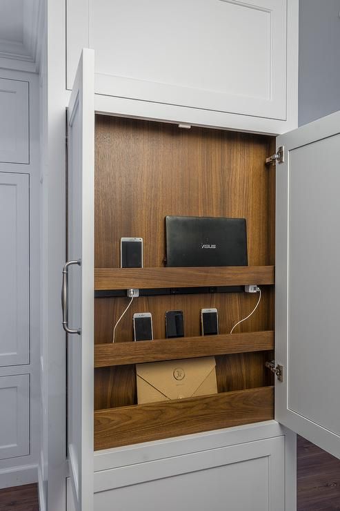 Slide-Out Charging Station Hides Devices in Cabinetry
