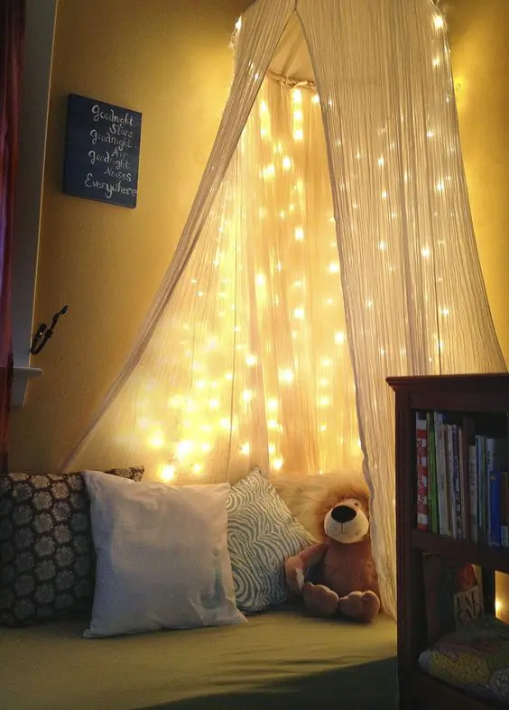 Drape String Lights Over a Canopy for a Cozy Reading Nook