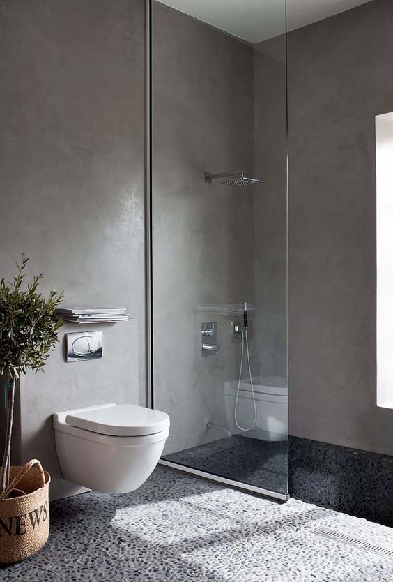 Streamline Your Bathroom with a Wall-Mounted Toilet and Floating Shelf