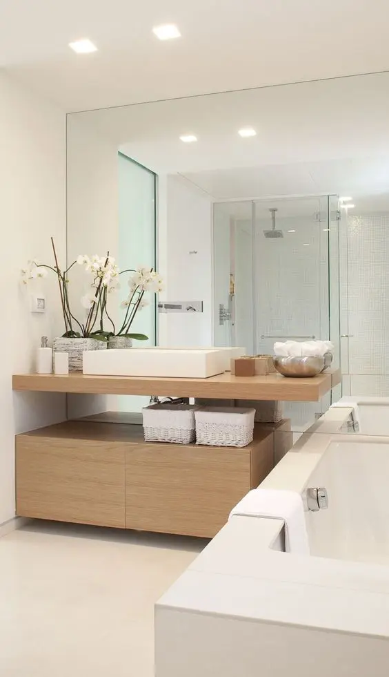 Floating Wood Vanity With White Woven Baskets