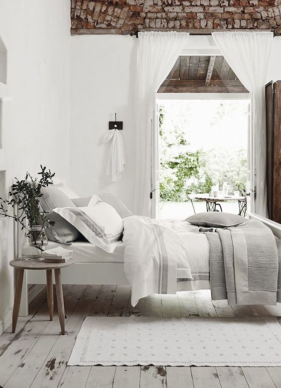 Layer White and Grey Bedding for a Soothing Atmosphere