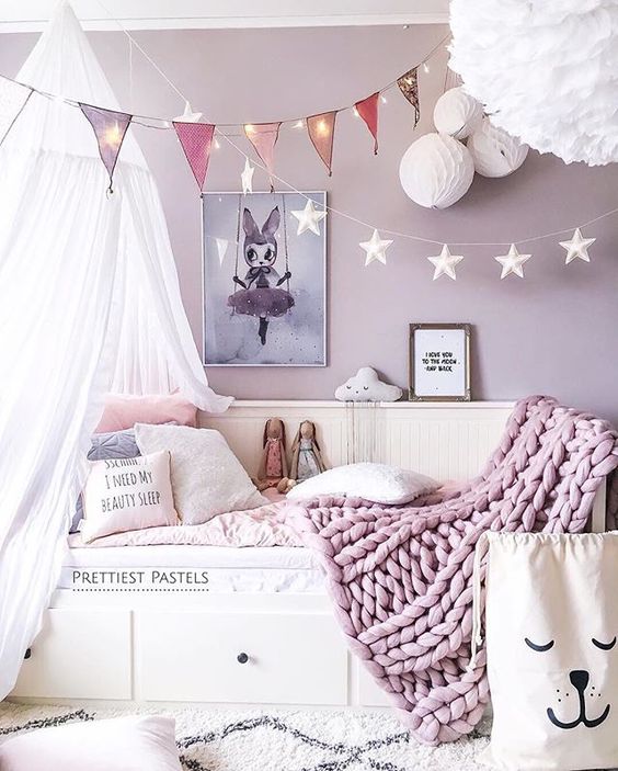 Star and Bunting String Lights Add Whimsy Above the Bed