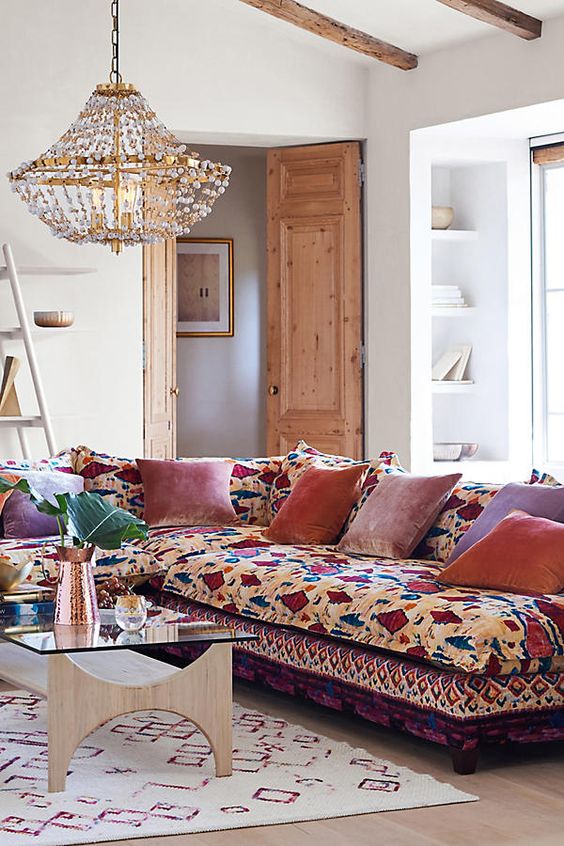 Layer Velvet Pillows for Soft Color on a Bold Sofa