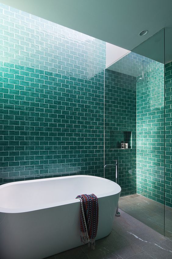 Glossy Teal Subway Tile Walls Create a Spa-Like Atmosphere