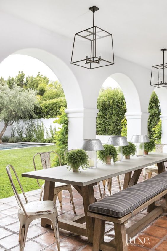 Galvanized Lamps With Potted Greenery Create Tabletop Ambiance