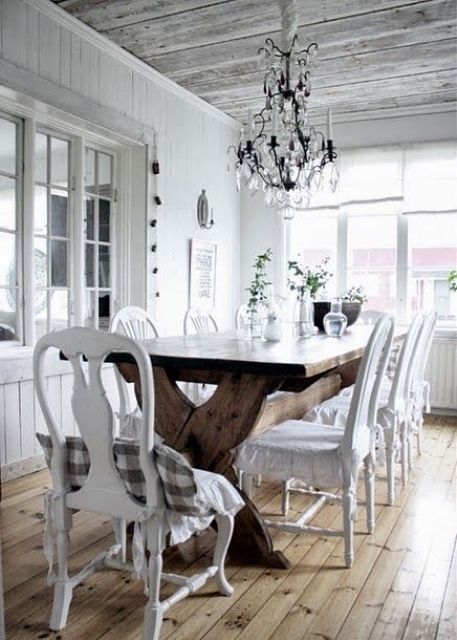Rustic Trestle Table Anchors a Farmhouse Dining Room