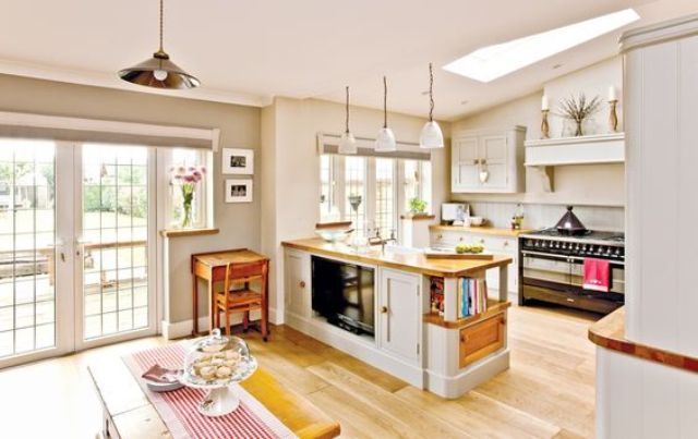 Kitchen Island with Built-In Media and Bookshelves