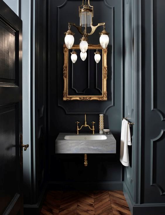 Frame Your Chandelier with an Ornate Gold Accent