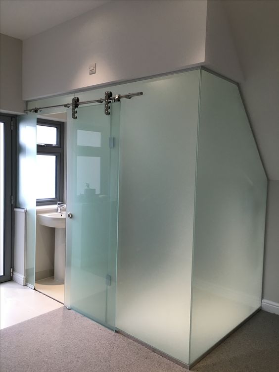 Conceal a Pedestal Sink with Frosted Glass Walls