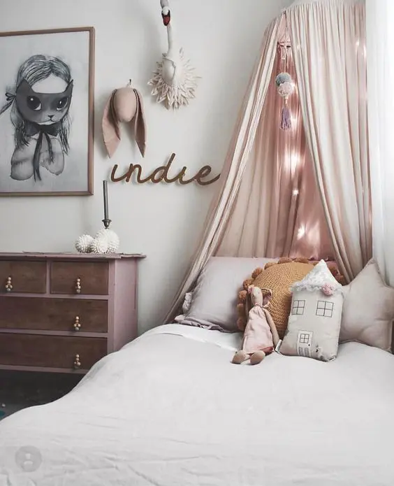 Wooden Name Sign Adds Personal Touch Above Dresser