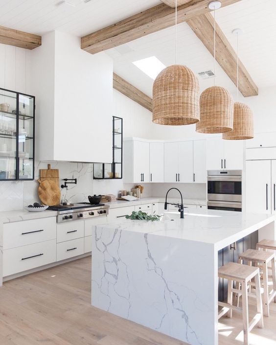 Woven Bell Pendant Lights Add Natural Texture Above a Marble Island