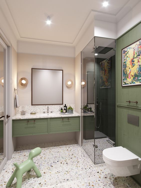 Green Vanity Cabinets Pair With Terrazzo Flooring