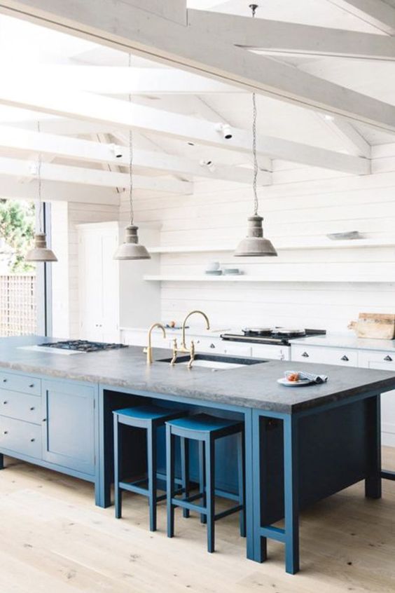 Deep Blue Island Base With Stone Top Creates a Moody Contrast