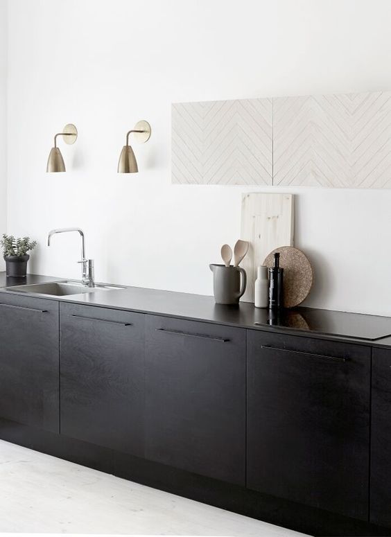 Brass Wall Sconces Warm Up Dark Cabinetry