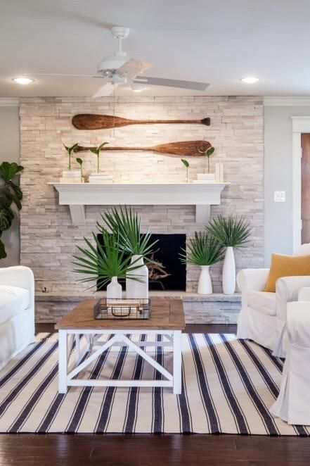 Wooden Oars as Nautical Wall Art Above the Mantel