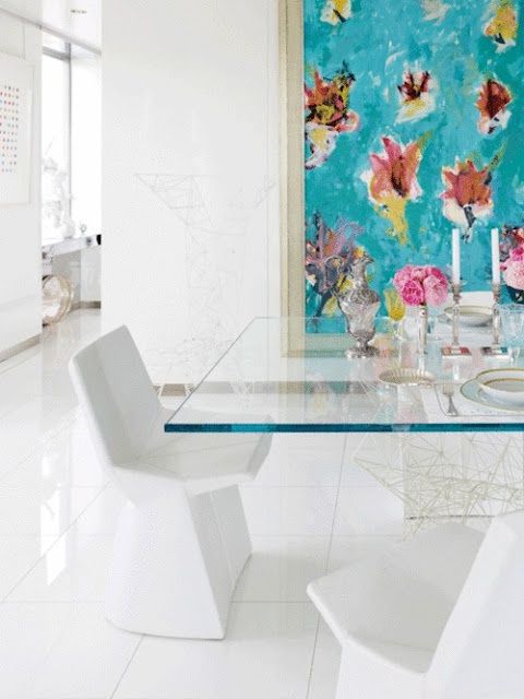 Bold Abstract Art Anchors a Light and Airy Dining Space