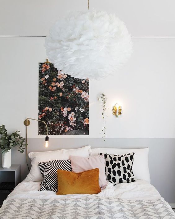 Large Floral Print Adds a Soft Garden Scene Above the Bed