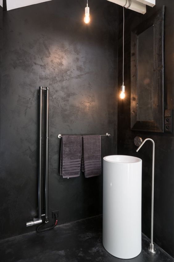 Maximize Space with a Tall, Minimalist Pedestal Sink