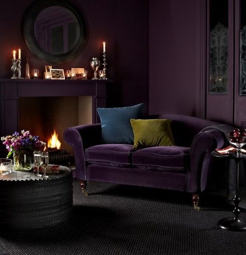 Deep Plum Velvet Sofa with Contrasting Pillows