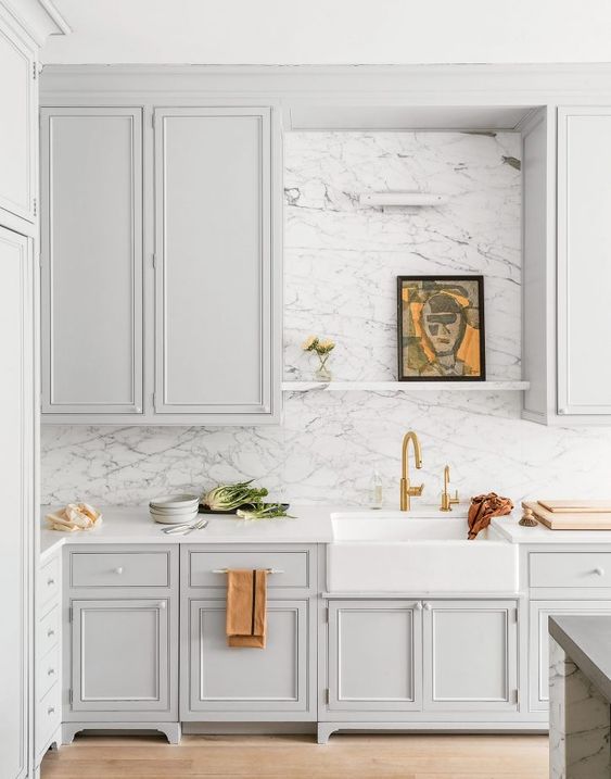 Framed Artwork Adds Personality Above Backsplash