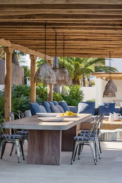 Woven Pendant Lights Add Natural Texture Under a Pergola
