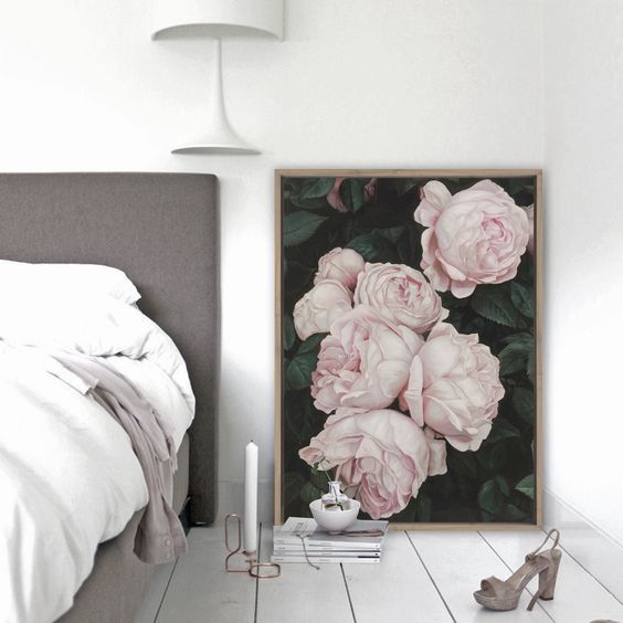 Oversized Floral Art Adds Soft Romance to a Minimalist Bedroom