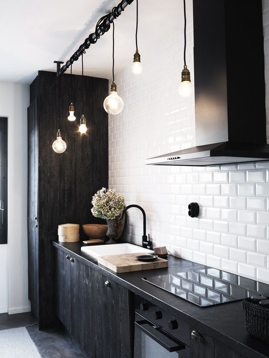 Track Lighting with Exposed Bulbs for Industrial Flair