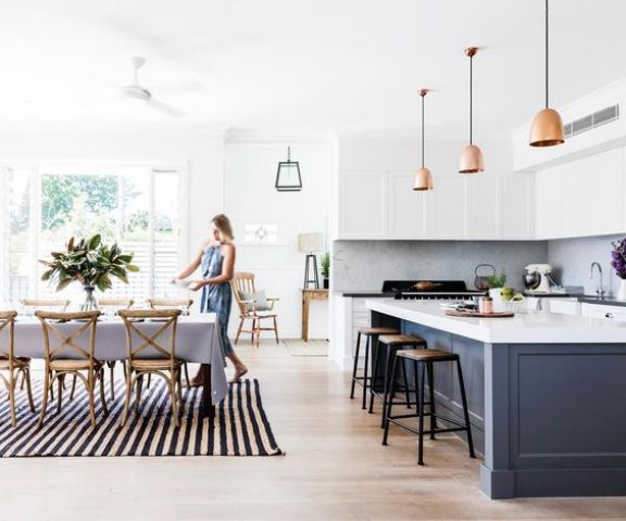 Dark Island with White Countertop Anchors Kitchen Zone