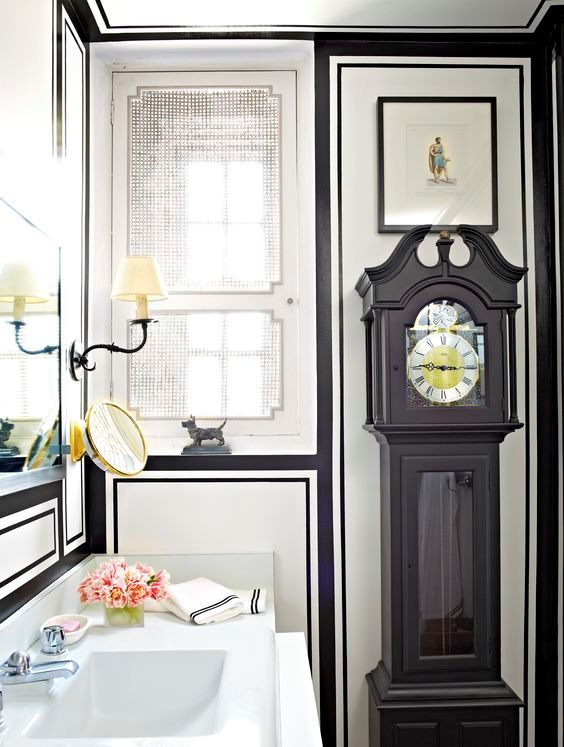 Black Grandfather Clock Adds Dramatic Height to Bathroom