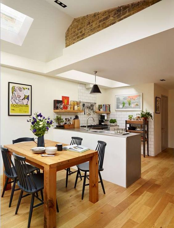 Wood Dining Table with Dark Spindle Chairs