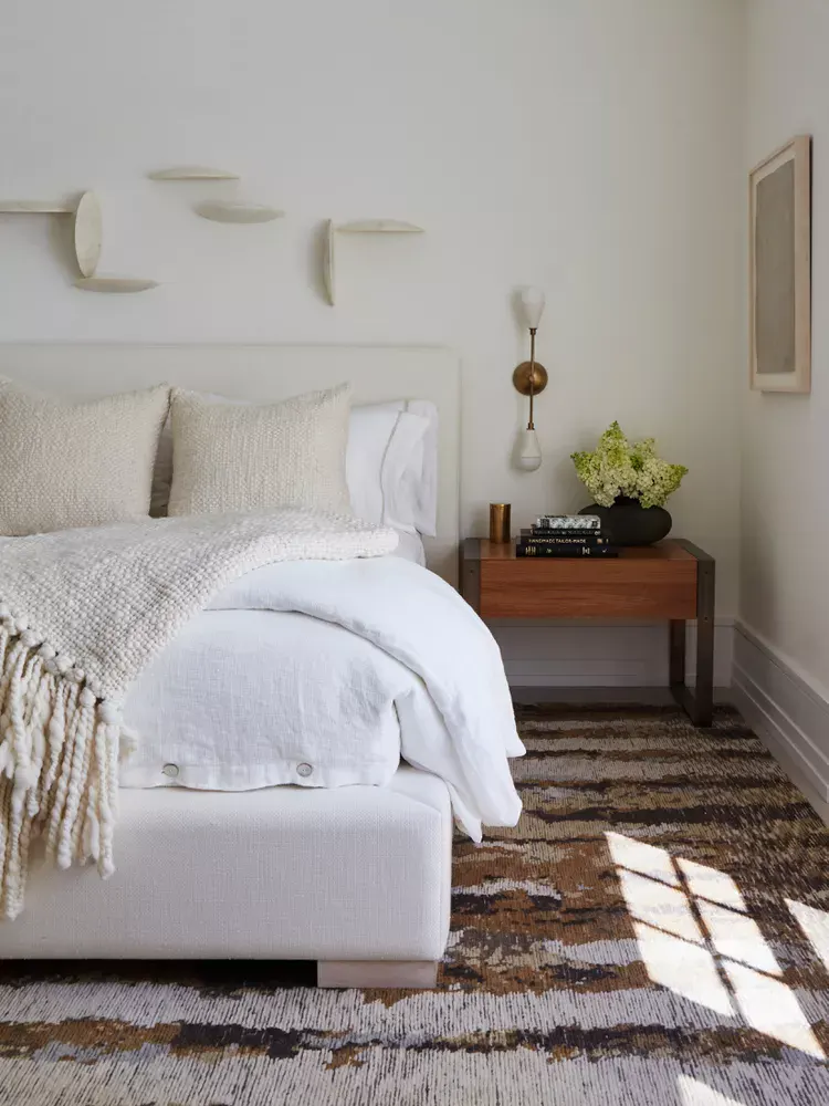 Sculptural Wall Art Adds Organic Interest Above the Bed