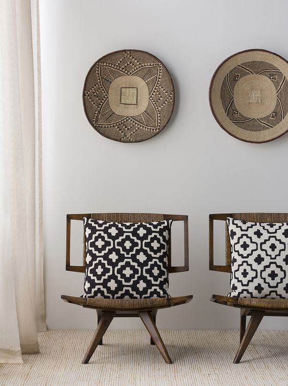 Woven Wall Baskets Add Natural Texture Above Chairs