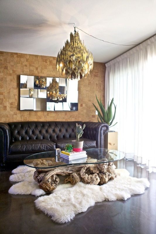 Driftwood Base Anchors a Glass Coffee Table