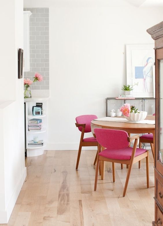 Pink Upholstered Mid-Century Chairs Add a Playful Pop
