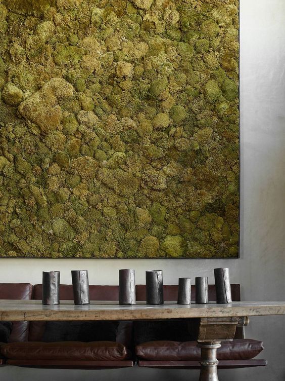 Large Moss Panel Adds Organic Texture Above Seating