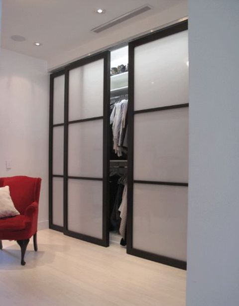 Obscure Closet Clutter with Frosted Glass Sliding Doors