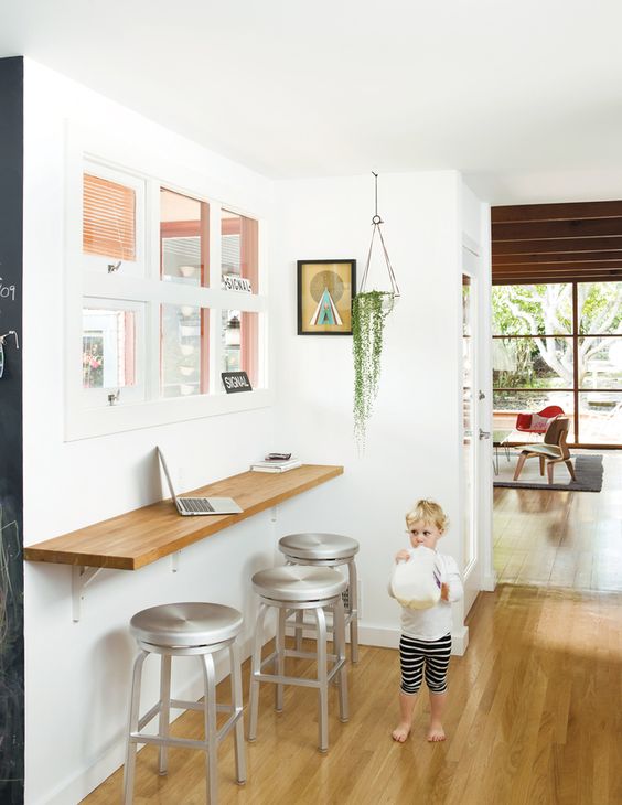 Floating Wood Countertop With Industrial Stools