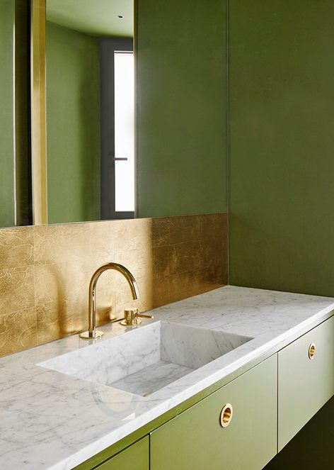 Gold Leaf Backsplash Adds Glamour Behind Your Sink