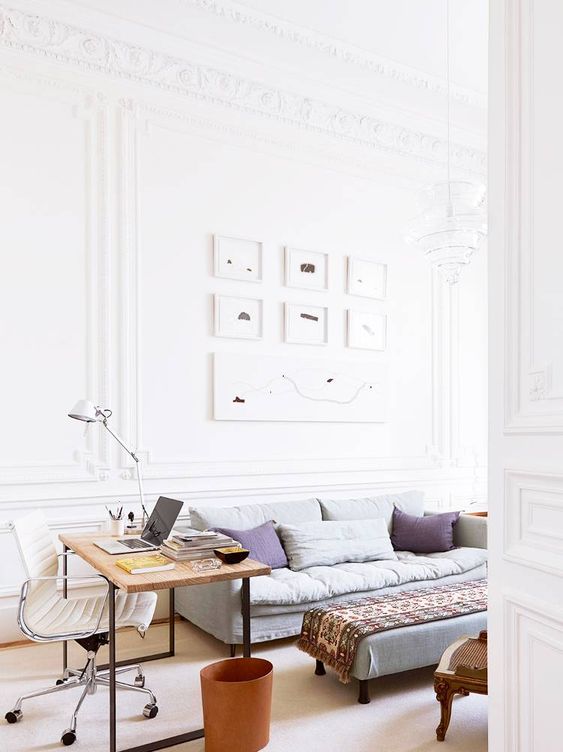 Gallery Wall of Minimalist Art Frames a Serene Space