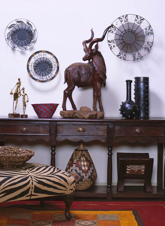 Grouped Decorative Fans Add Circular Accents Above Console