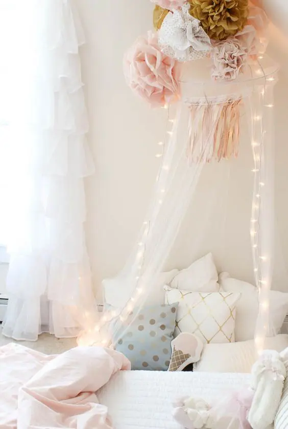 Tulle Canopy With Fairy Lights Creates a Magical Bedtime Spot