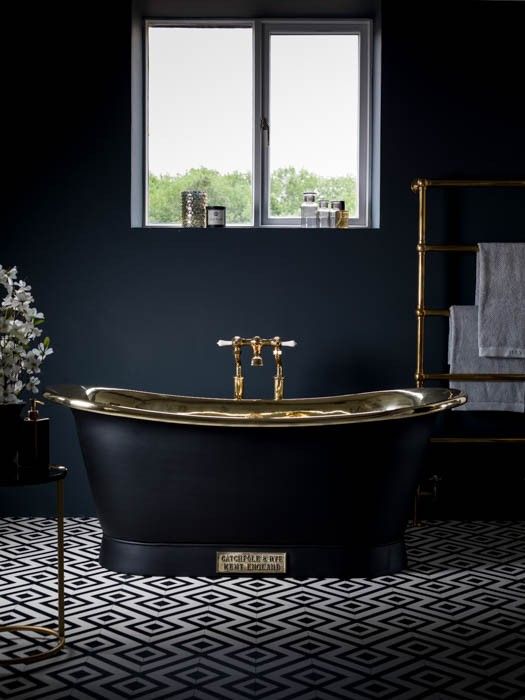 Black Freestanding Tub With Brass Rim Adds Luxury