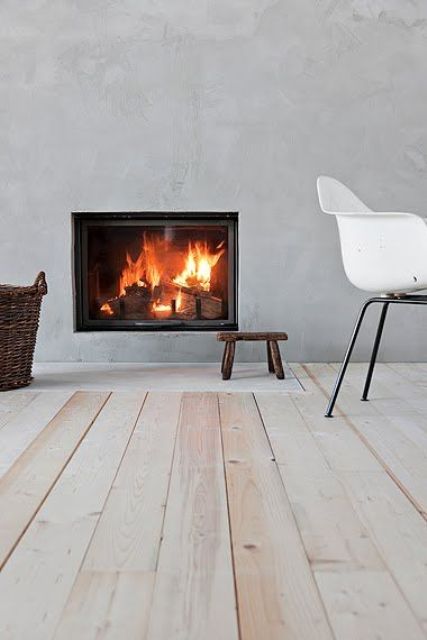 Place a Small Wooden Stool by the Fireplace for Rustic Charm