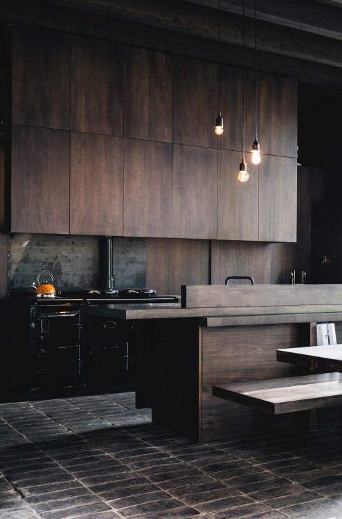 Dark Wood Built-In Seating Creates a Dining Nook