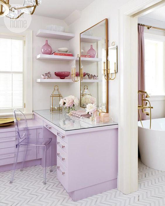 Glass Top Desk and Clear Chair Create a Light Vanity Area