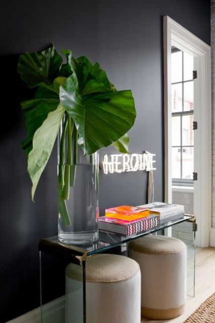 Oversized Greenery Makes a Bold Statement on a Glass Console