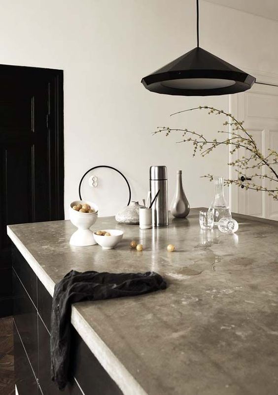 Concrete Countertop With A Minimalist Collection Of Kitchen Essentials
